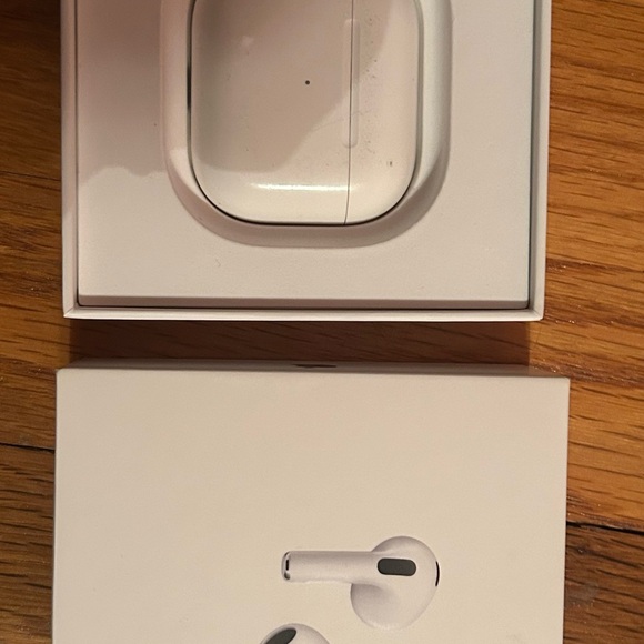 Apple AirPods generation 3 with Charging Case and box.